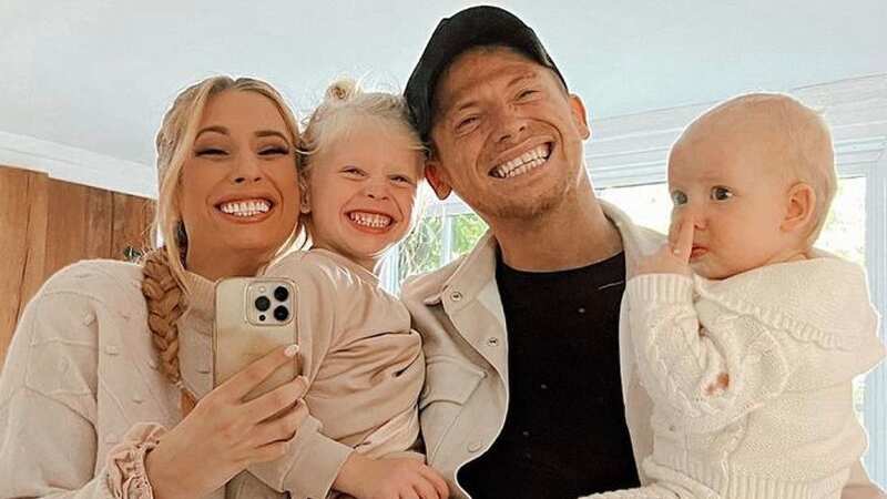Stacey Solomon cradles baby bump after teasing she