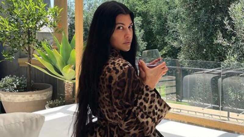 Kourtney Kardashian praised for showing off real curves in leopard-print robe