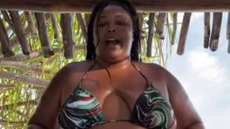Lizzo shows off curves in tiny string bikini as she blasts body-shamers