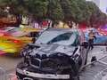 Five dead after car ploughs into crowd before driver throws money in air