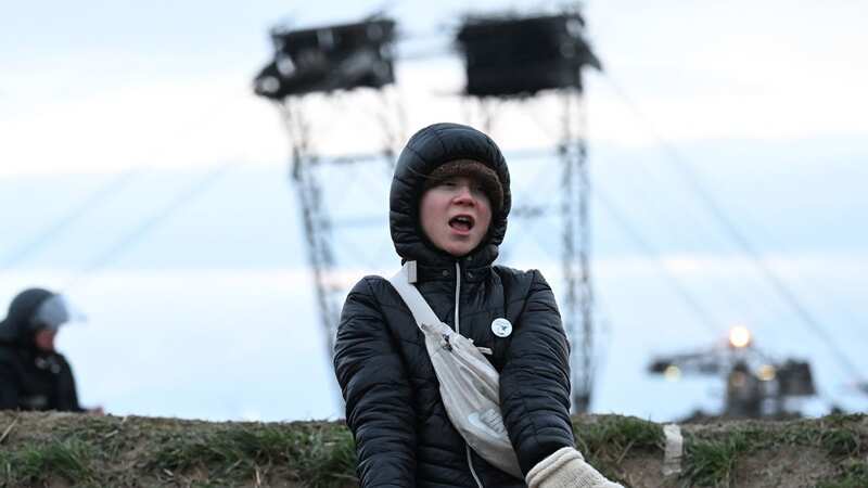 Greta Thunberg was led away from the protests on Sunday (Image: Federico Gambarini / Avalon)