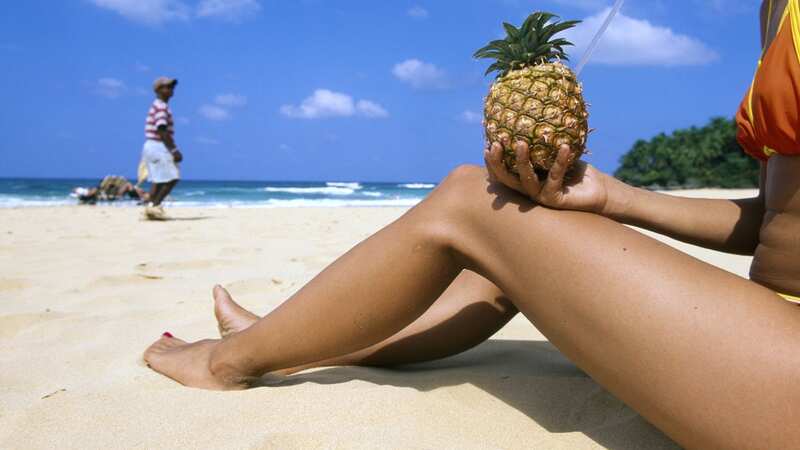 Pineapples on their swim wear gave this couple an interesting holiday (Image: Katja Kreder/imageBROKER/REX/Shutterstock)