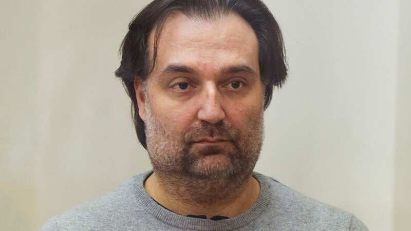 Brian Walshe stands during his arraignment on the charges of Ana Walshe