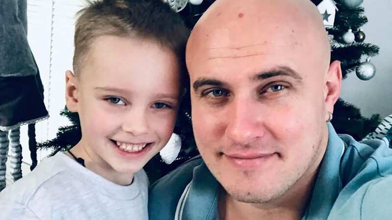 Father Mykola Antonov and his child (Image: social media /e2w)