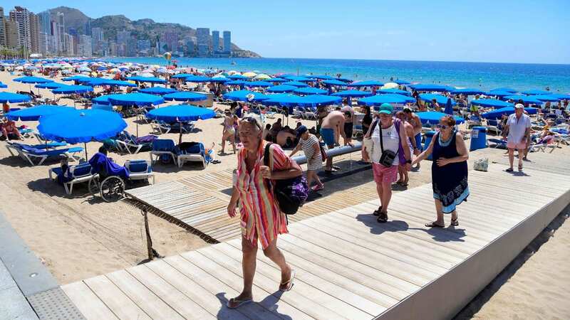 Brits have been dashing to book summer trips despite the cost of living crisis tightening purses (Image: AFP via Getty Images)