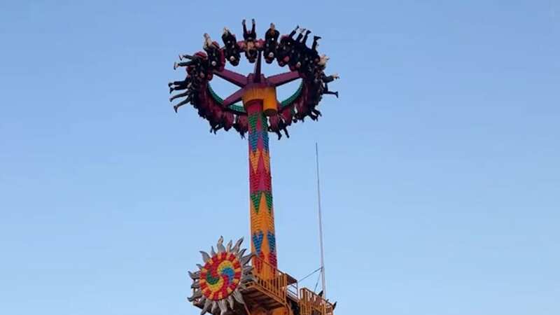Terrified theme park riders trapped upside down 32ft in air after breakdown