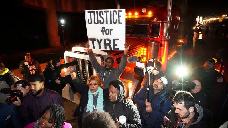 Protesters march in a street in Memphis (Image: Gerald Herbert/AP/REX/Shutterstock)