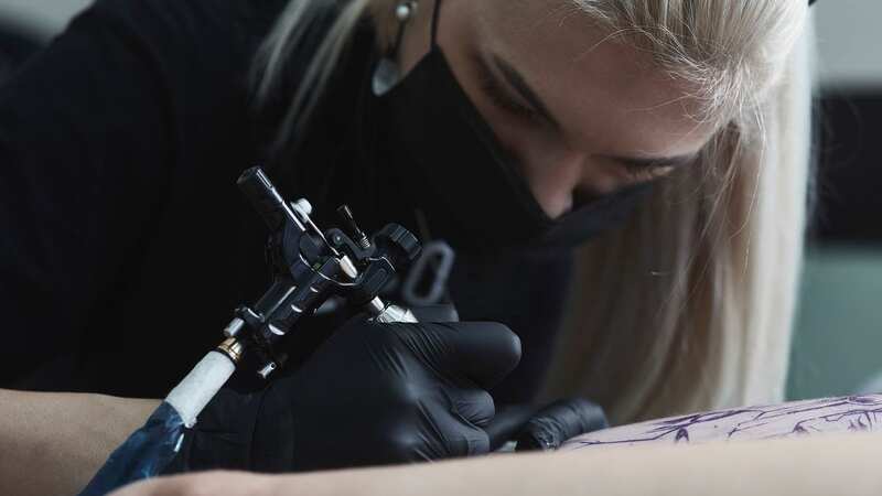 A customer was raging that a tattoo artist hid their initials in their new ink (stock photo) (Image: Getty Images/fStop)