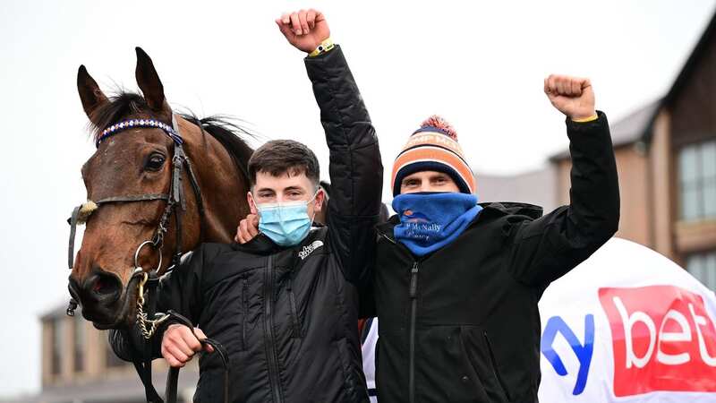 Ronan McNallly (right) celebrating a win by Dreal Deal with son Tiernan (Image: PA)