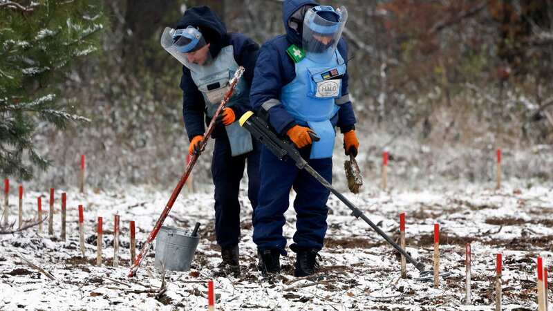 Land being checked in Ukraine for mines (Image: Getty Images)