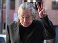Frail Ozzy Osbourne flashes peace sign in first sighting after forced retirement