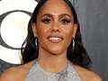 Alex Scott makes surprise appearance at the Grammys in slinky silver dress