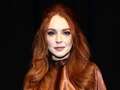Lindsay Lohan glows in ultra rare public appearance with family at Fashion Week dqxikeidqkikdinv