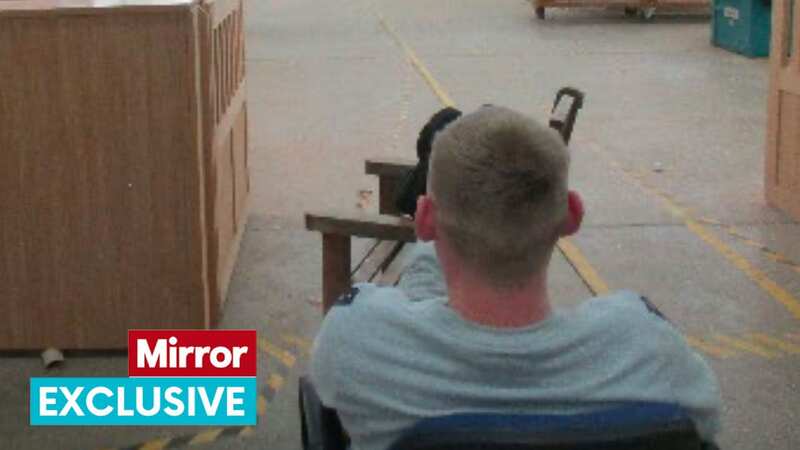 An inmate relaxing in a workshop