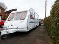 Neighbours at war as joiner told to shift caravan parked on street and pavement