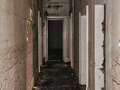 Remains of abandoned children's home with haunting past captured in eerie images