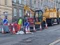 Massive 'sink hole' opens up on busy street and unveils lost underground tunnel