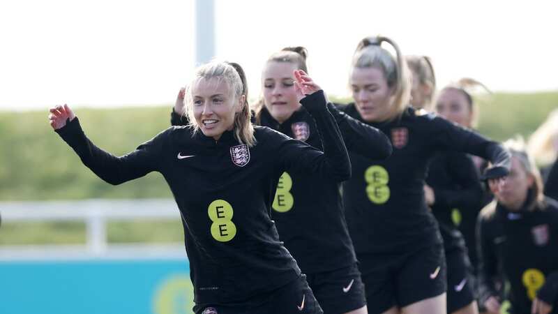 Leah Williamson and teammates warm up during a training session at St George