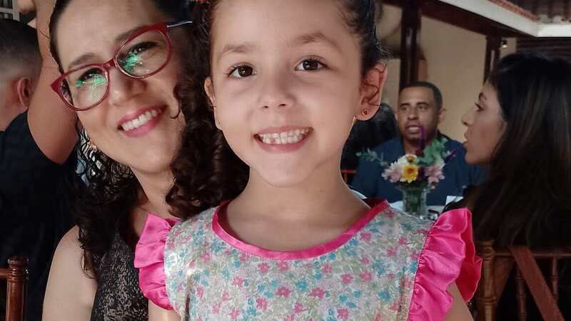 Isabela Tiburcio Fermino with her mother Gislene (Image: Newsflash)