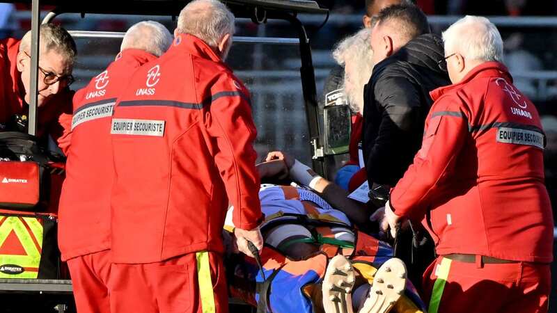 Mercer is stretchered off in the Top 14 match between Lyon and Montpellier (Image: AFP via Getty Images)