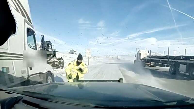 Patrol officer inches away from death after nearly being hit by runaway truck