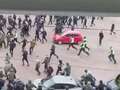 Hundreds of Rangers and Celtic fans clash in ugly scenes ahead of Old Firm final