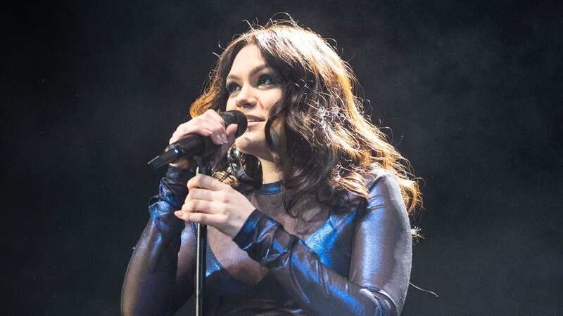 Pregnant Jessie J shows off her baby bump in see-through outfit during gig