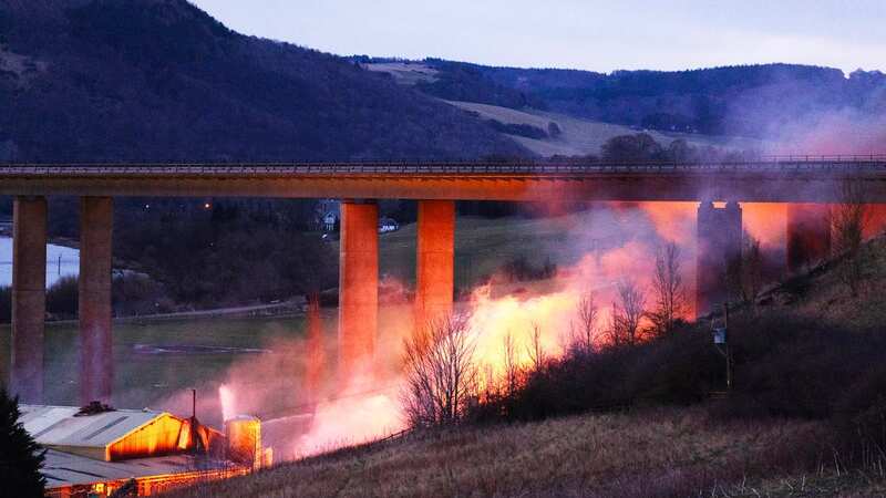 Huge explosion as fire shuts down bridge causing commuter chaos as M90 closed