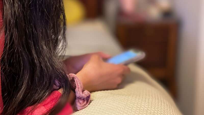 TikTok will clamp down on excessive app usage with new time limit (Image: Getty Images)