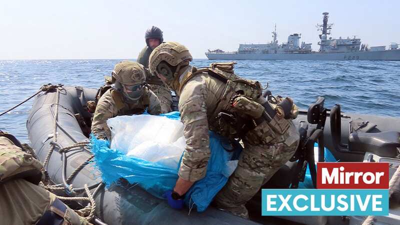 HMS Lancaster Royal Marines Boarding Team remove seized weapons from the vessel (Image: UK MOD Crown copyright)