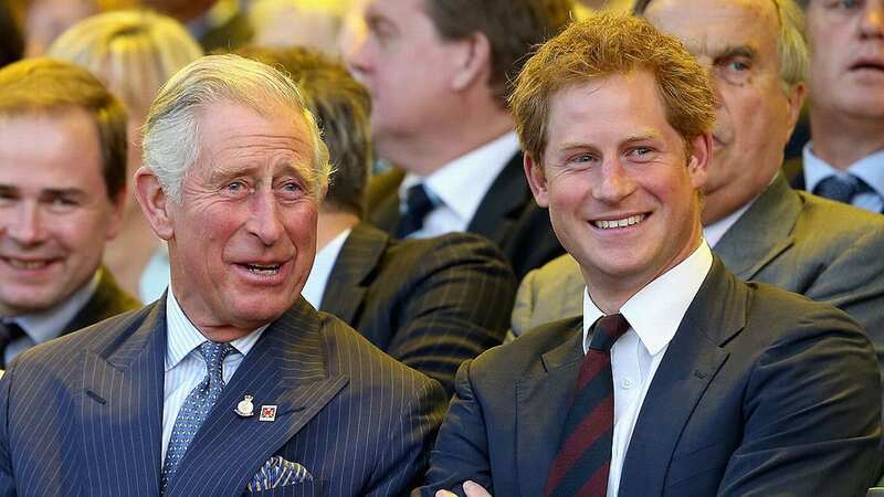 King Charles and Prince Harry in happier times (Image: Getty Images)