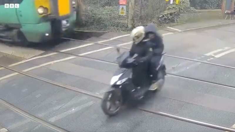Terrifying moment moped driver is 