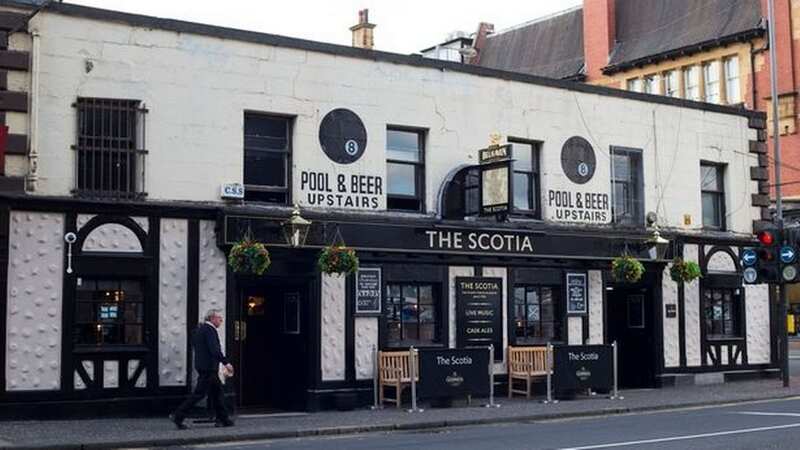 A team of ghost hunters think the picture shows a woman smiling (Image: Scotia Bar)
