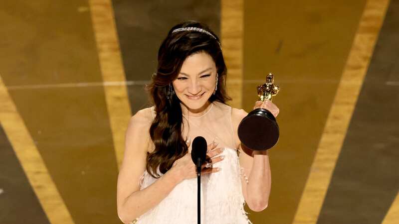 Michelle Yeoh emotional as she becomes first Asian woman to win best actress