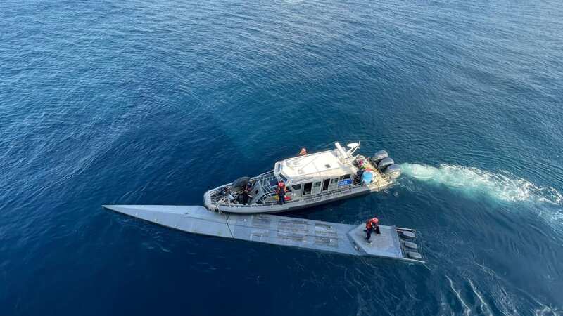 Submarine stuffed with £72million of cocaine and two dead bodies found off coast