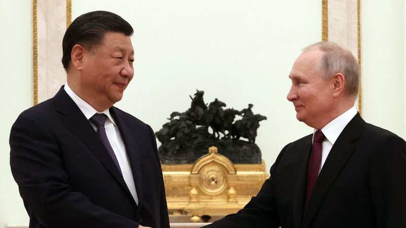Putin tries to shut down global isolation claims by hosting China’s Xi Jinping