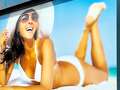 Tanning salon boss ordered to take down 'offensive' picture of woman in a bikini dqxikeidqkikdinv