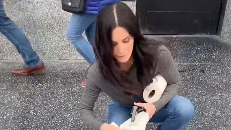 Courteney Cox hilariously channels Monica Geller as she cleans Walk of Fame star