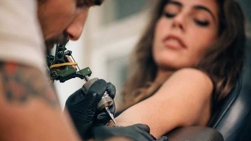 A woman is refusing to have her matching tattoo with her ex removed (stock photo) (Image: Getty Images/EyeEm)