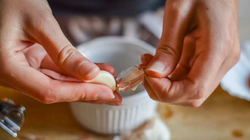 Peel garlic in seconds with the easy tip (Image: Getty Images/iStockphoto)