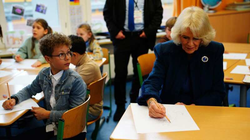 Camilla impresses school kids as she shows off little-known artistic talent