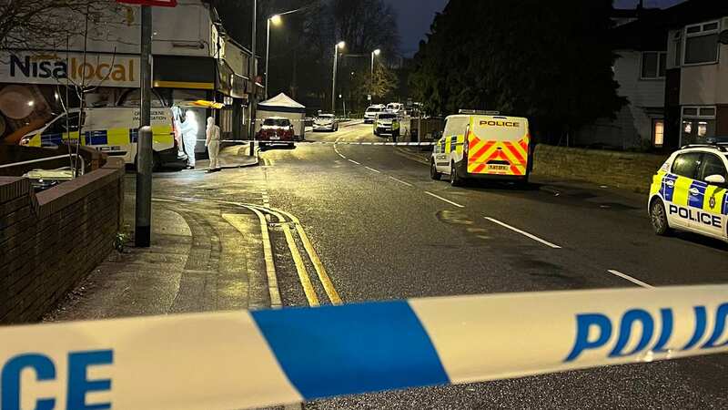 Forsenic teams comb the cordoned-off murder scene for evidence (Image: Ben Lack-YappApp)