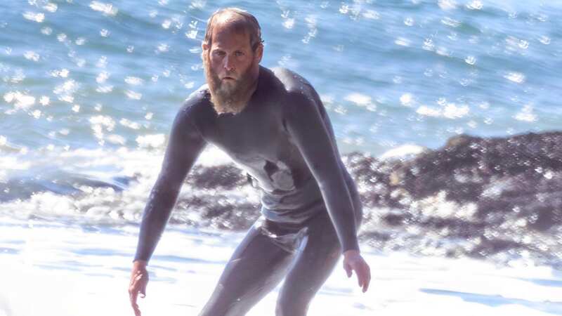 Jonah was seen surfing (Image: Diggzy/Jesal / SplashNews.com)