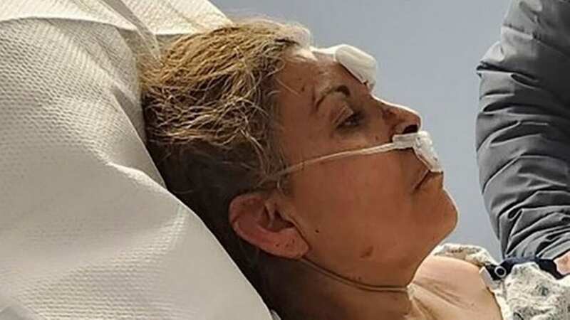 Patricia Borges lies in a hospital bed after the chocolate factory she worked in exploded (Image: Aaron Paz)