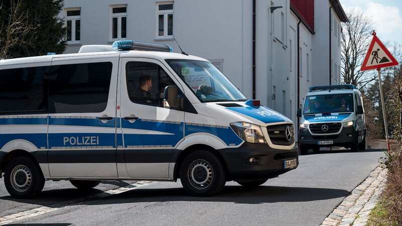 A police patrol car blocks off the road to the child and youth care centre in Germany (Image: Daniel Vogl/picture-alliance/dpa/AP Images)