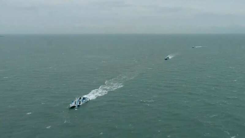 Chinese ships sail in the Taiwan Strait (Image: AP)