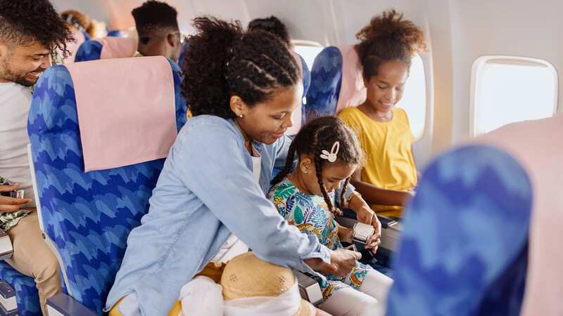 The woman sat in the other seats, but was left chuckling to herself when instant karma hit (Stock Image) (Image: Getty Images)