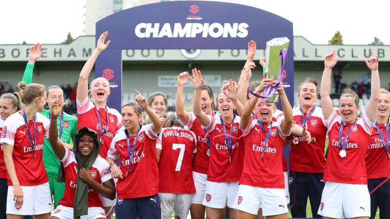 Arsenal celebrate with the WSL trophy after winning the league at Meadow Park on May 11, 2019 against Manchester City (Image: Catherine Ivill)