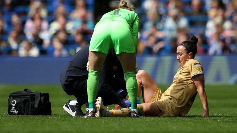Lucy Bronze of FC Barcelona goes down with an injury against Chelsea
