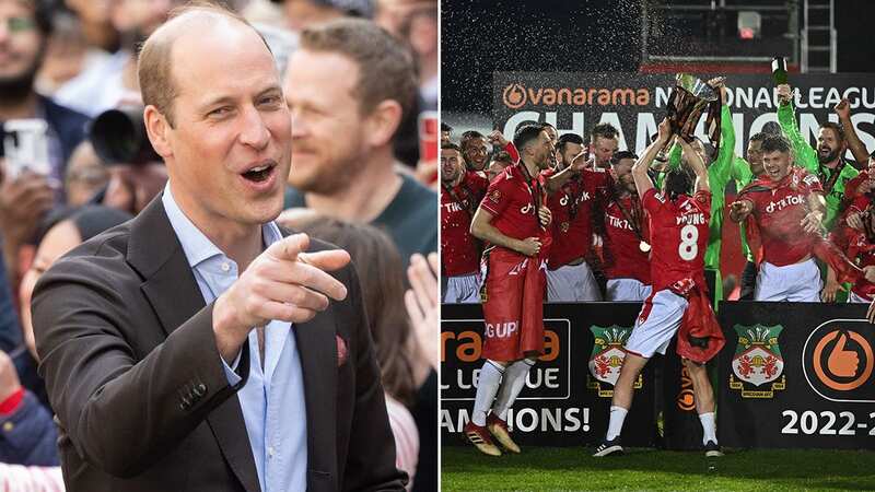 Wrexham duo Ben Tozer and Luke Young lift the National League trophy (Image: Getty Images)